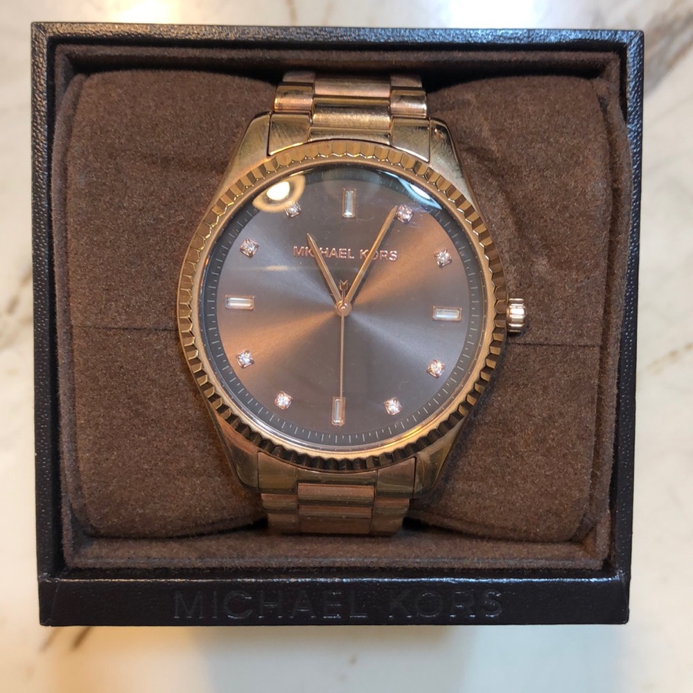 Micheal Kors women’s rose gold watch